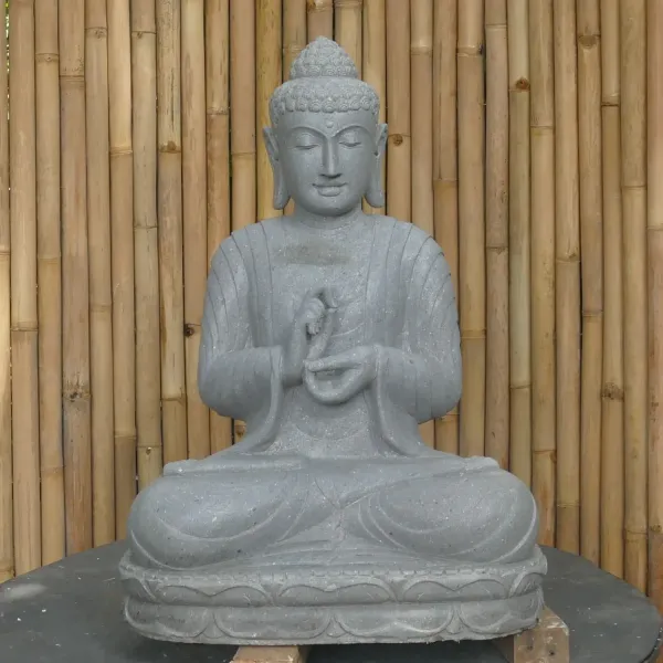 Seated Buddha made of Riverstone in Dharmachakra gesture of wheel of the teaching of the Dharma, H. 80cm. 
